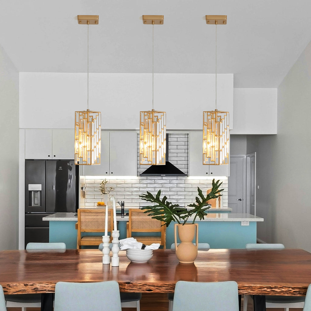 Three small gold crystal prism pendant lights