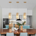 Three small gold crystal prism pendant lights