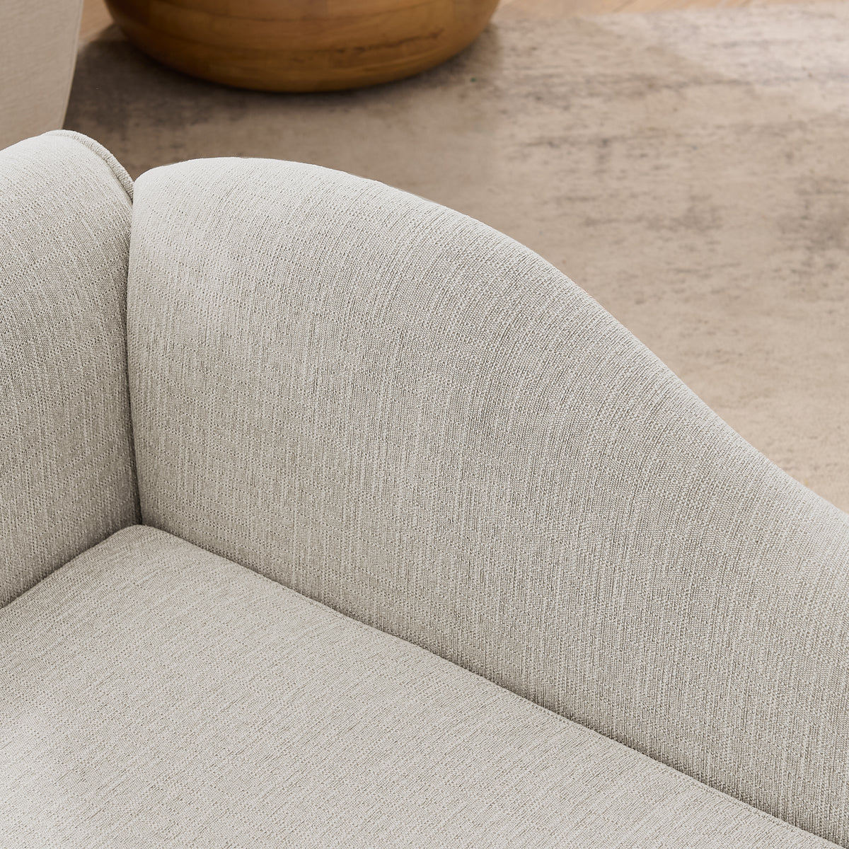 Close-up of the wave backrest and breathable linen upholstery