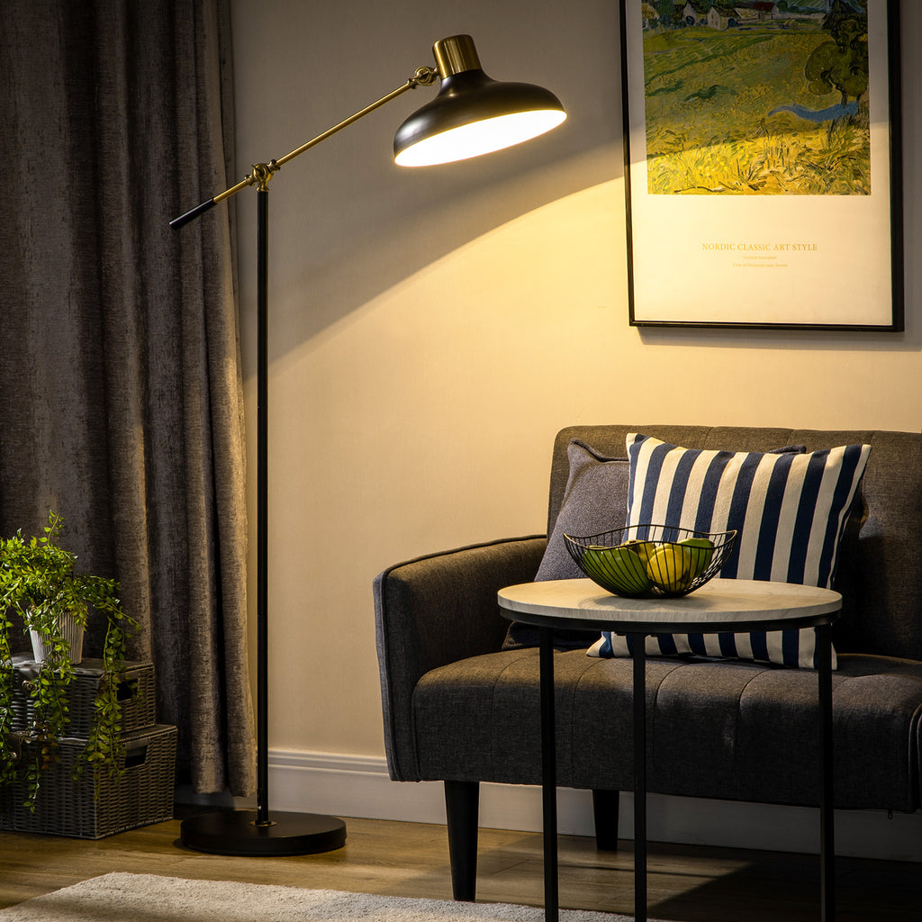 Black and gold adjustable floor lamp with balanced arm in a living room, view 4