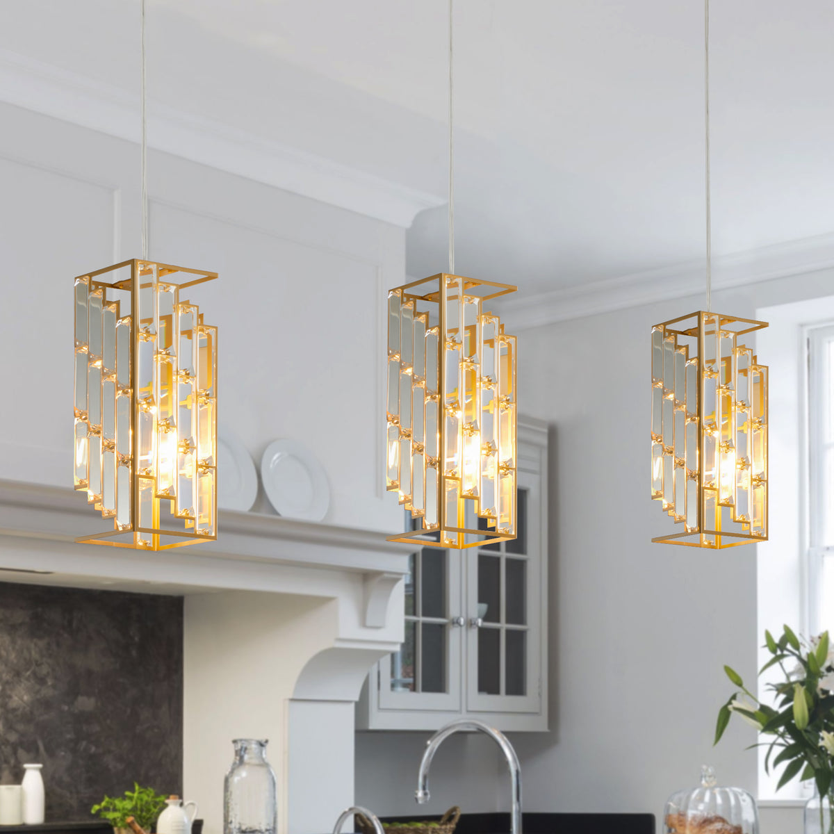 Three small gold crystal prism pendant lights, view 2