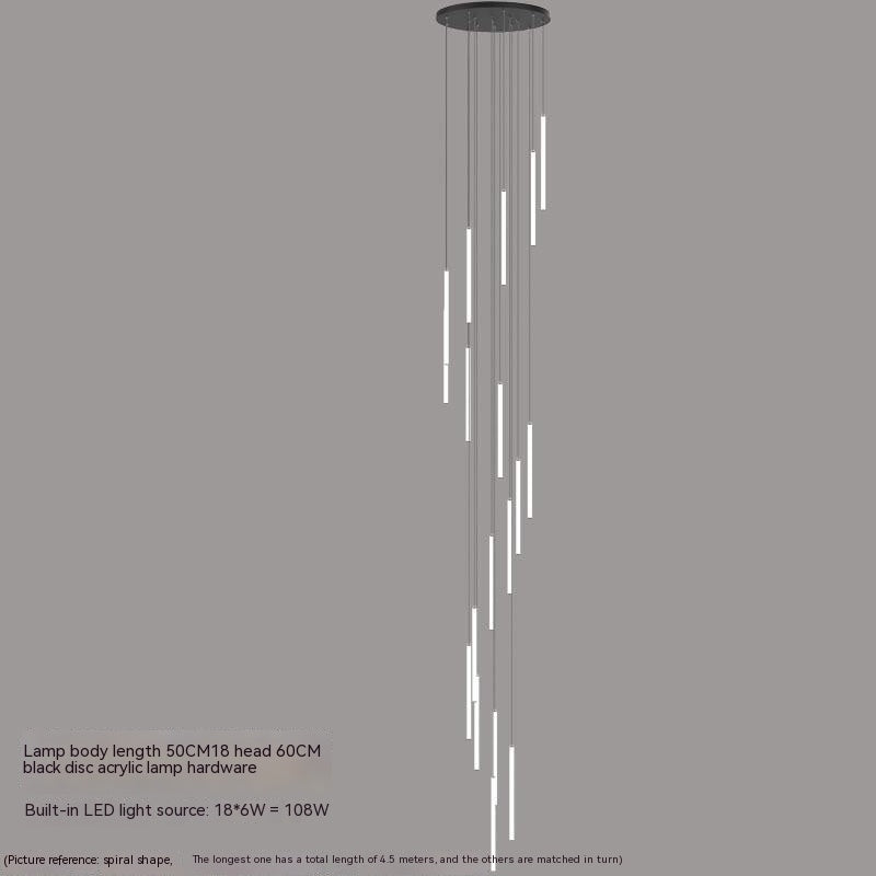 Spiral multi-light chandelier hanging in a stairwell foyer, view 3