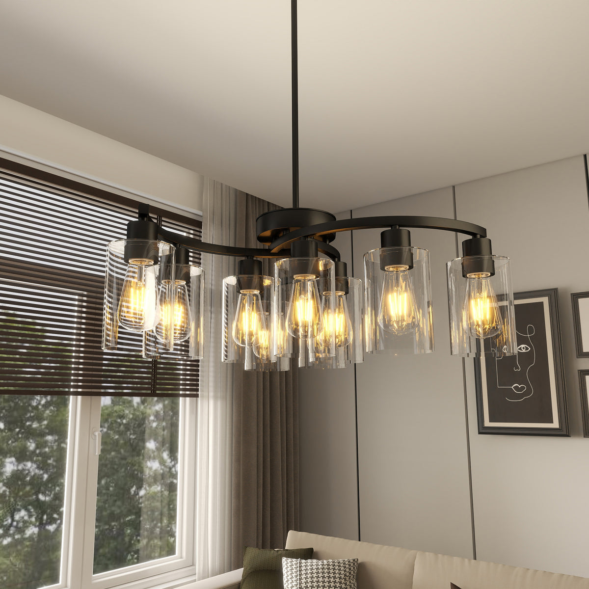 Nine-light black chandelier with clear glass shades over a dining table