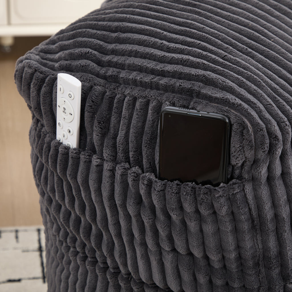 Phone tucked into the side pocket of the corduroy bean bag chair