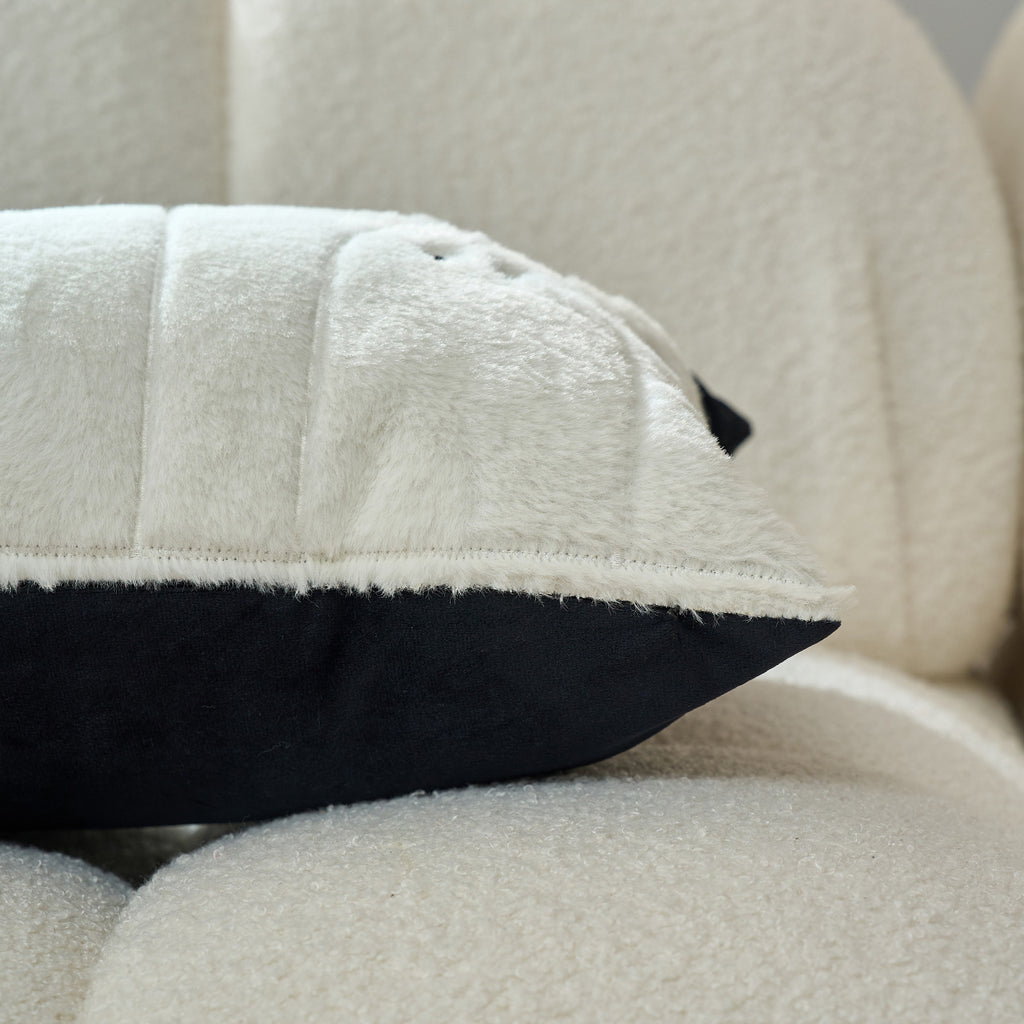 Close-up of the black and cream contrast trim on the cushion