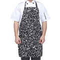 Tableware print halter neck apron in black with white cutlery motifs