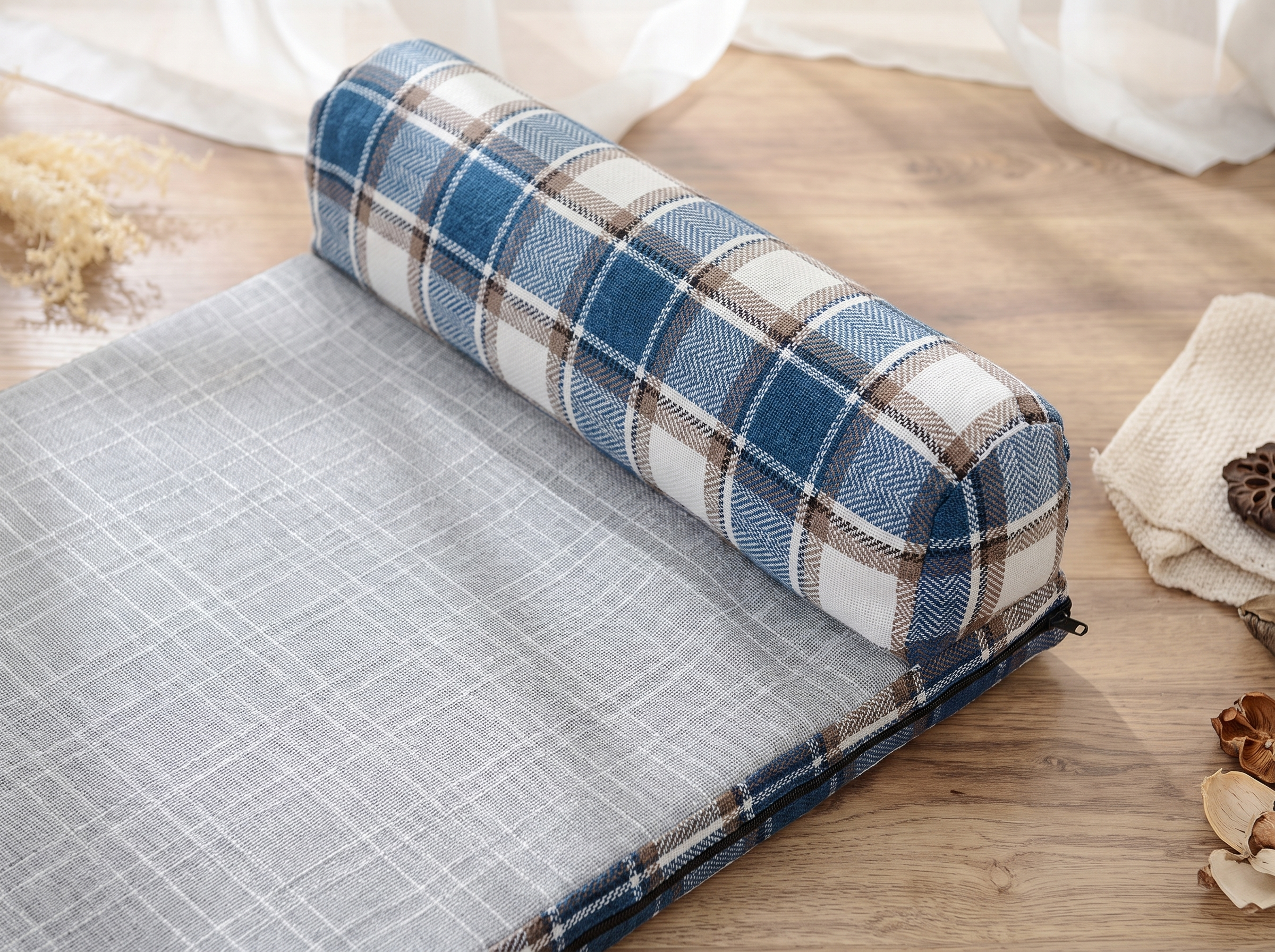 Macro detail of the blue check linen weave on the dog bed showing tight texture in natural light