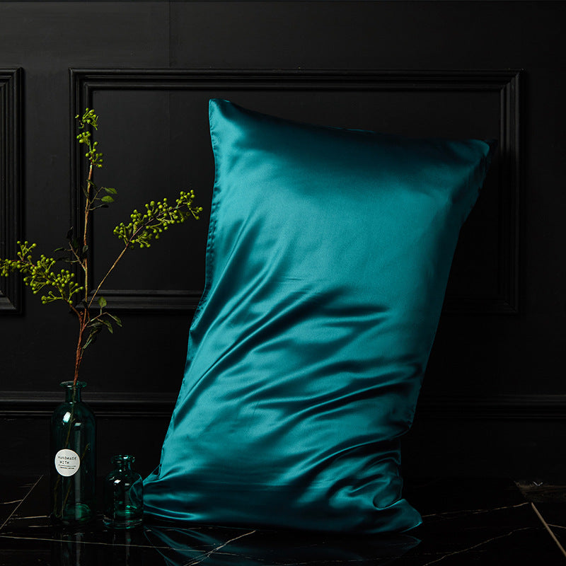Peacock blue mulberry silk envelope pillowcase with rich saturated colour and sheen