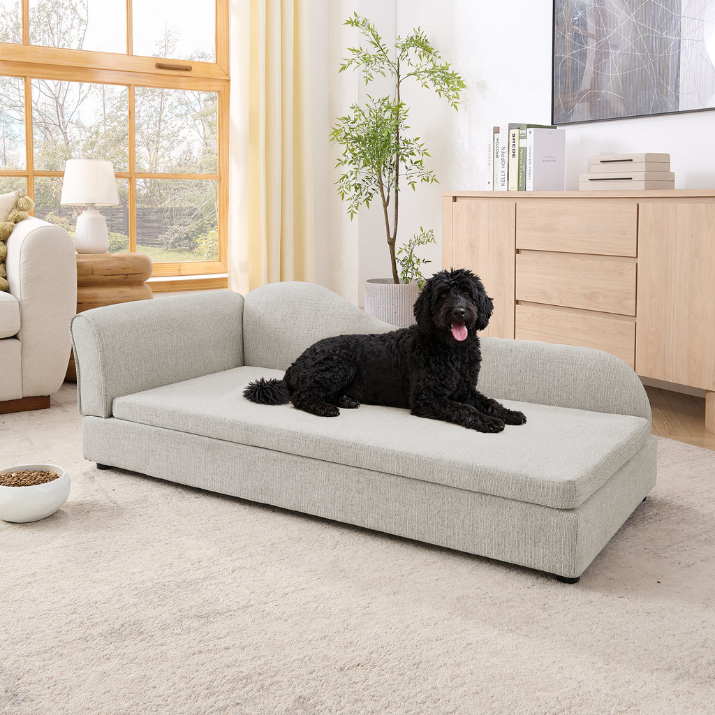 Dog lounging across the wave-backed beige linen pet sofa