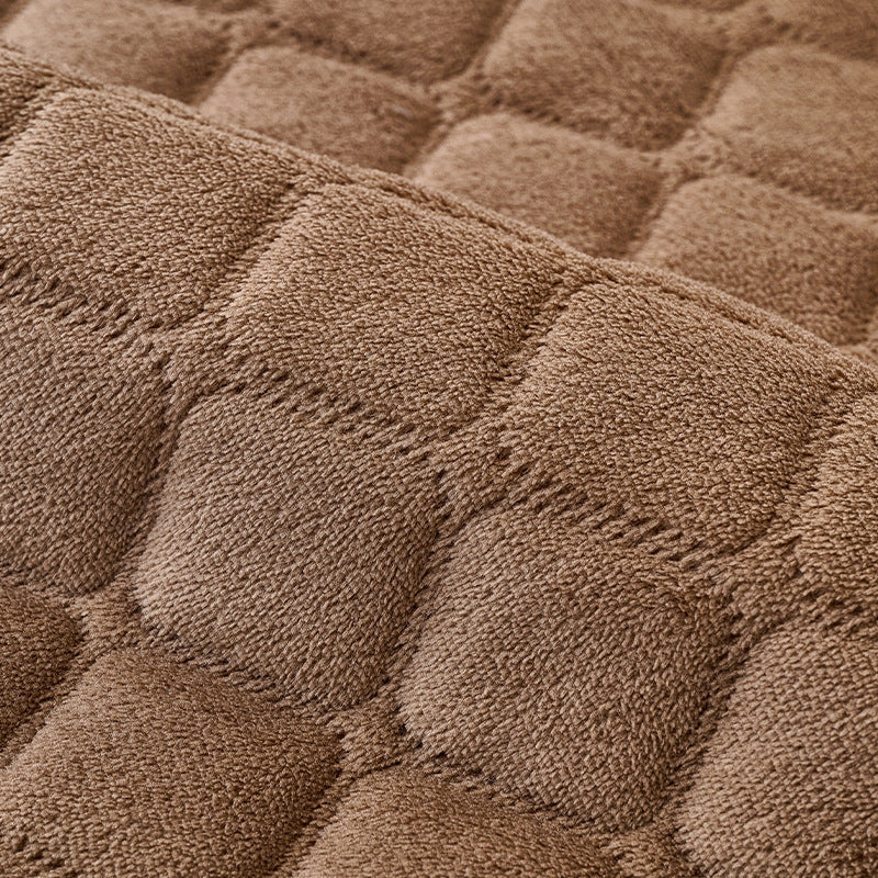 Close-up of the soft quilted diamond stitching on the pet bed